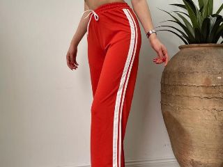 Pantaloni trening evazati cu dungi